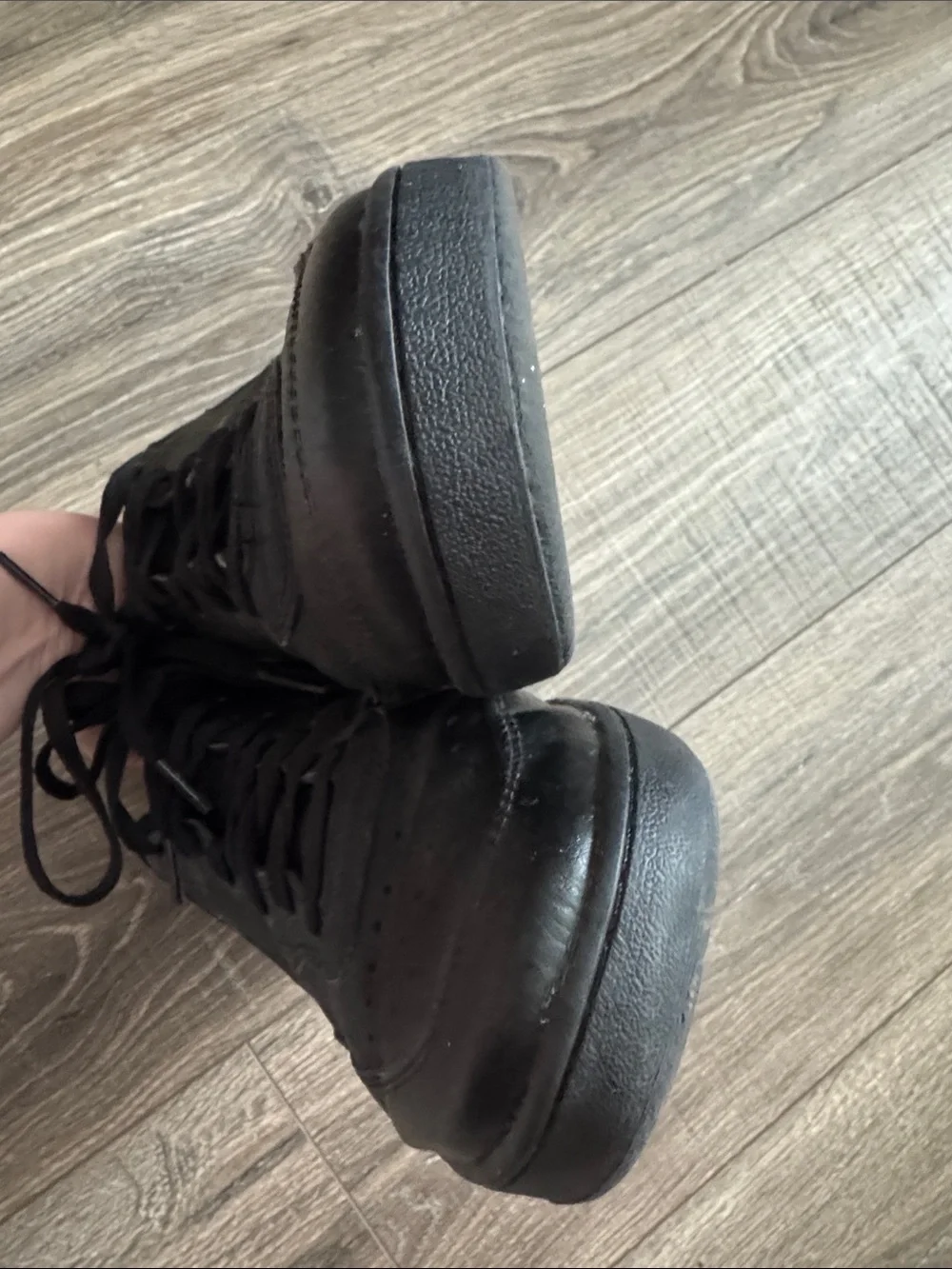 Nike Men’s All-Black Low-Top Leather Sneakers